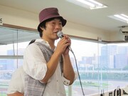 イベント冒頭で、自らの格言を踏まえて挨拶。「買ったら貯金してください。僕も家を買うまでには20年くらいかかりましたから」と、稼ぐコツを伝授。