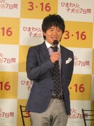 公開記者会見の一場面。