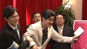 「囲み取材」