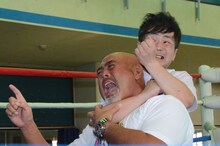 カラテカ入江と武藤敬司。