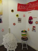 白い日傘もアイパーの手編み。