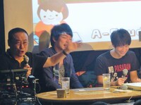 ハッピーカードを出した高橋を絶賛するA（左）と、困る高橋（右）。