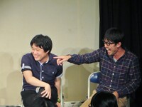 酒井を指差して笑うフィクサー大和。