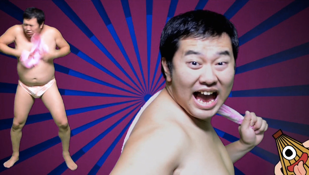 動画「とにかく明るい安村のとにかく明るいかんぷまさつ」のワンシーン。