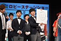 デッカチャンに対抗して10秒でいぬ太田の似顔絵を書いてみせるいぬ有馬。