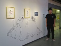 シャンプーハットこいでによるライブペインティングの様子。