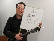 お相手の似顔絵を披露する松浦真也。