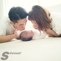 ジャングルポケット太田夫妻と娘の3ショット。