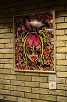 花のれんタリーズコーヒーに飾られているレイザーラモンHG「HG（ハードガール）」。