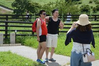 突如現れた東南アジアからの観光客。