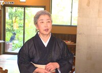 予約が絶えない宿の女将。