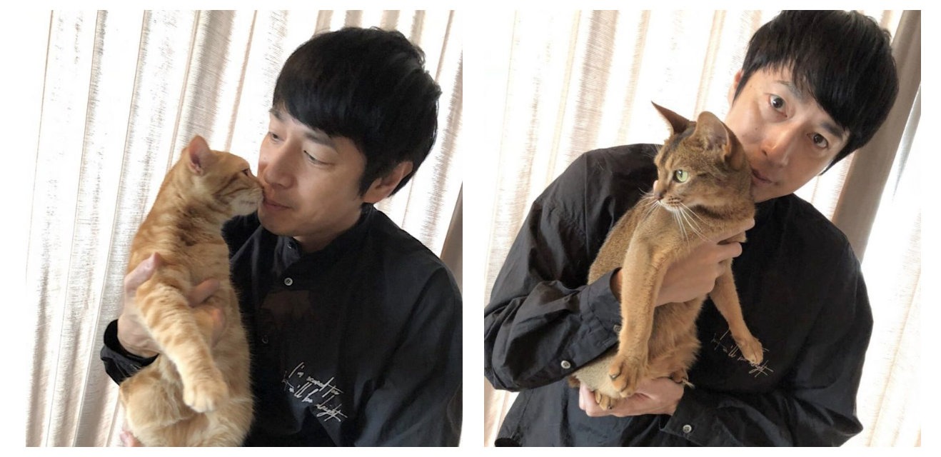 猫を抱くチュートリアル徳井。