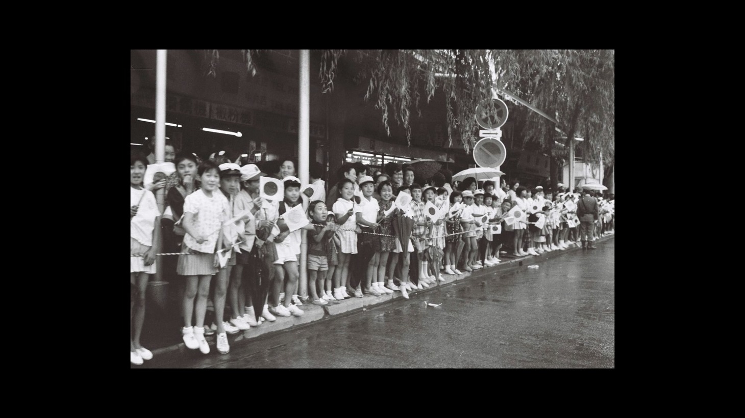火田聖一が初めて聖火ランナーを見たときの写真。