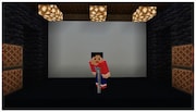 マイクラの世界に作ったライブハウスでピンネタを披露するウエストランド井口。