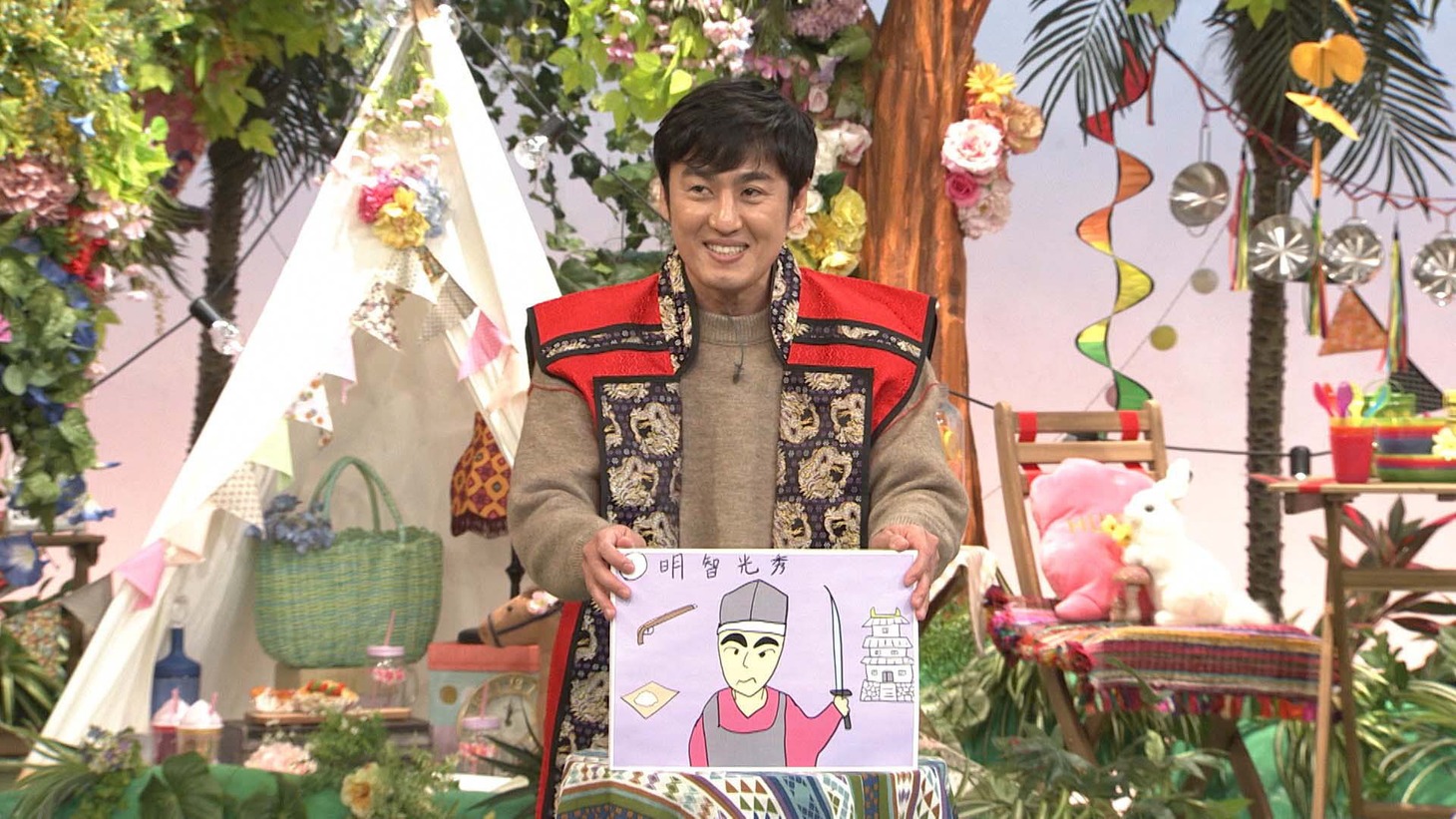 紙芝居を披露するロバート山本。