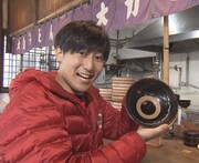 “うどん人”こと岡澤アキラ。