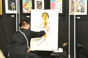 ライブペインティングを行うジミー大西。