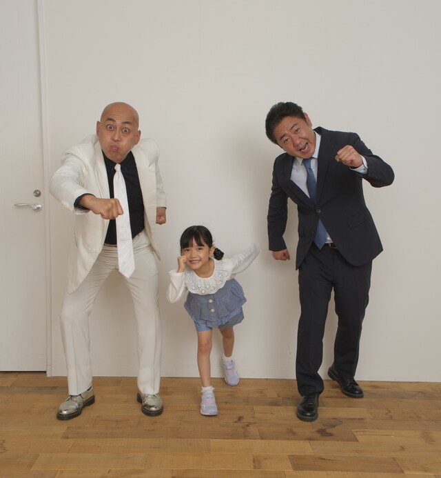 錦鯉と女子小学生。