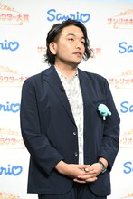 ハンギョドンを身に着けている見取り図・盛山。