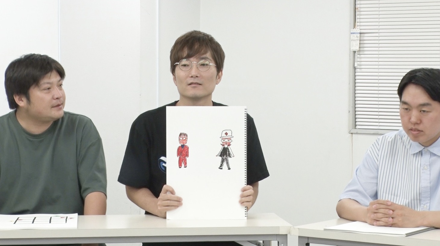 Tシャツをデザインする大宮セブンメンバー。