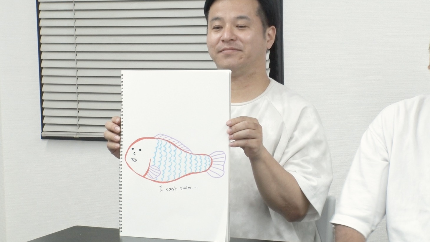 Tシャツをデザインする大宮セブンメンバー。