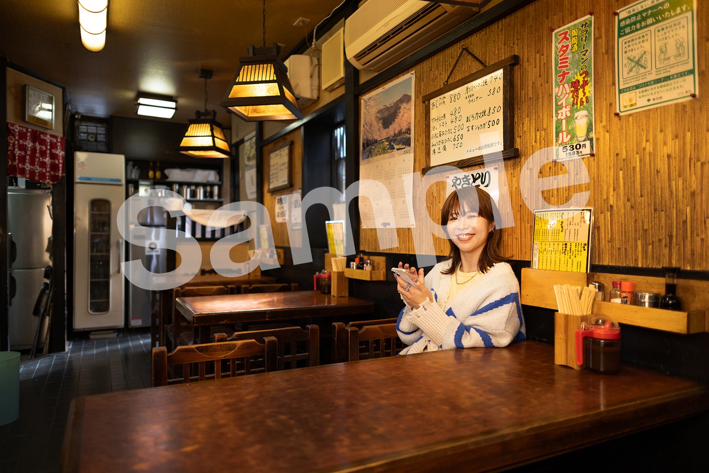 「行儀は悪いが天気は良い」サイン本お渡し会の限定ポストカードのイメージ（紀伊國屋書店 グランフロント大阪店）。
