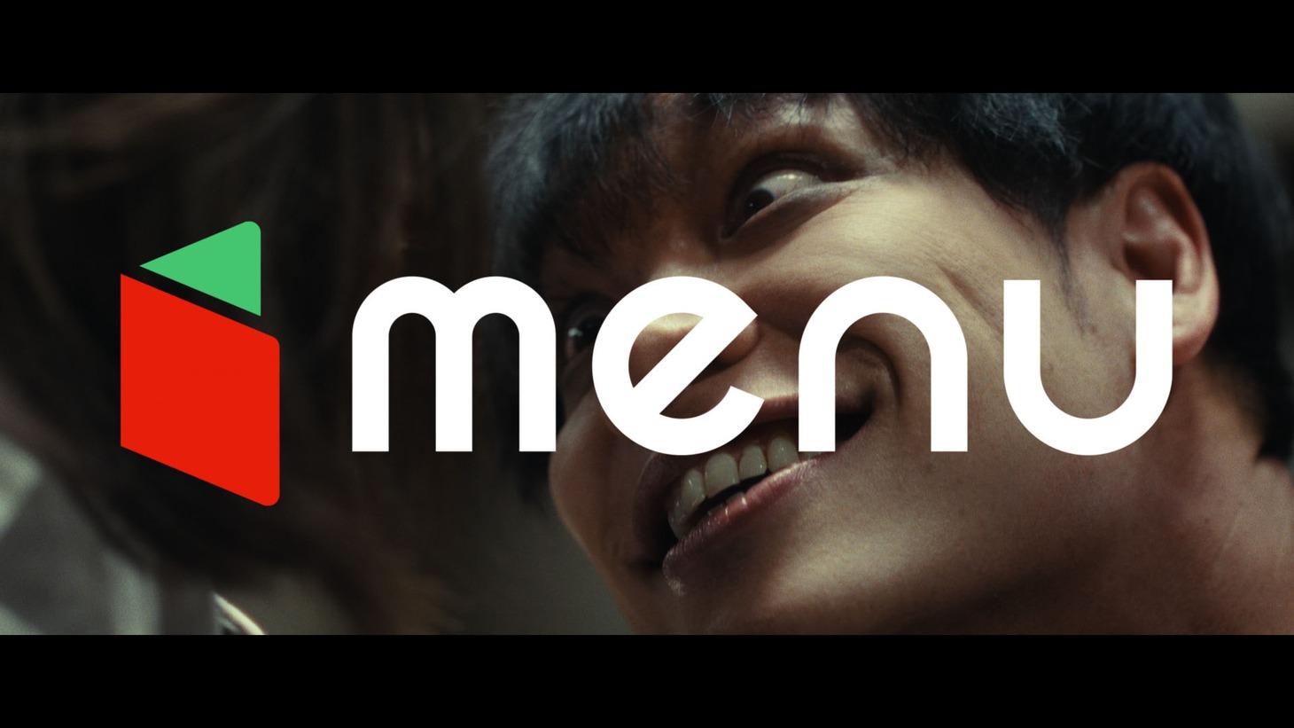 menu新CM「取り調べ」編のワンシーン。