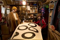 映画「まる」の場面写真。