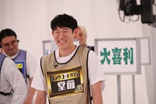 ロングコートダディ堂前