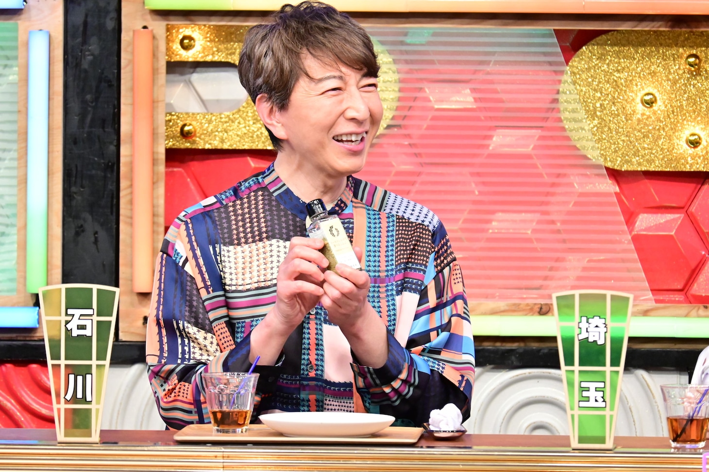篠井英介
