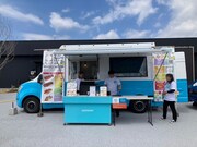 大阪・関西万博の会場内、西ゲートおよびEXPOアリーナに隣接したフードトラックエリアにて販売されている「ワールドKANPAIビール」のベースビール