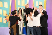 勝利を喜び合うかが屋チーム