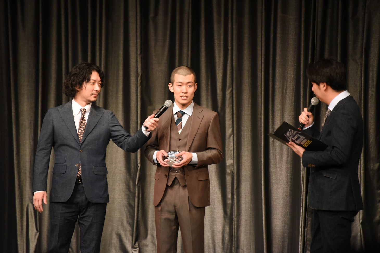 前回王者の清川雄司（中央）