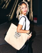 BIG KNOTとオリオンビール株式会社のコラボアイテムのビジュアルのモデルを務めるTanzi