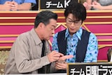左から光石研、及川光博