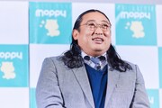 ポイ活サービス「モッピー」の新CM発表会に登壇したロバート秋山