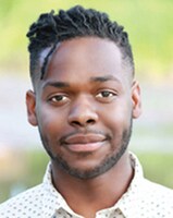 トム・コリンズ役を演じるアーロン・ハリントン。