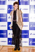 「『越路吹雪に捧ぐ』発売記念　龍真咲スペシャルイベント」フォトセッションより龍真咲。（撮影：高樹涼子）