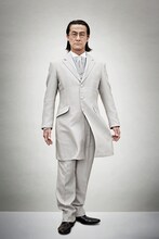 粟根まこと演じる小泉琢磨。