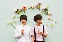 アナ。右が大久保潤也。