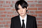 長田真英