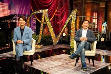 左から井上芳雄、小池修一郎。