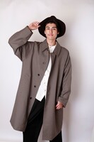 井阪郁巳扮するミュート。