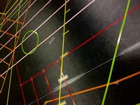 「舞台『刀剣乱舞』」稽古場の様子。俳優の立ち位置の目印となるバミリが、床に多数貼られている。