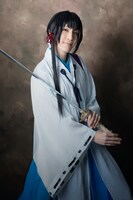 田中稔彦扮する鷺原左京。