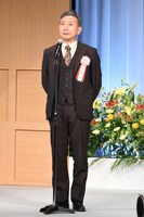 プレゼンターの山崎一。