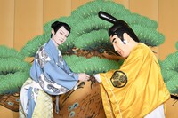 信康さん（右）から名刺を受け取る市川染五郎（左）。