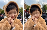 ぎゅっと握った手を重ねた、サンタさんへのお願いポーズ！ ふわふわのくまさんのパーカーがとっても似合う。