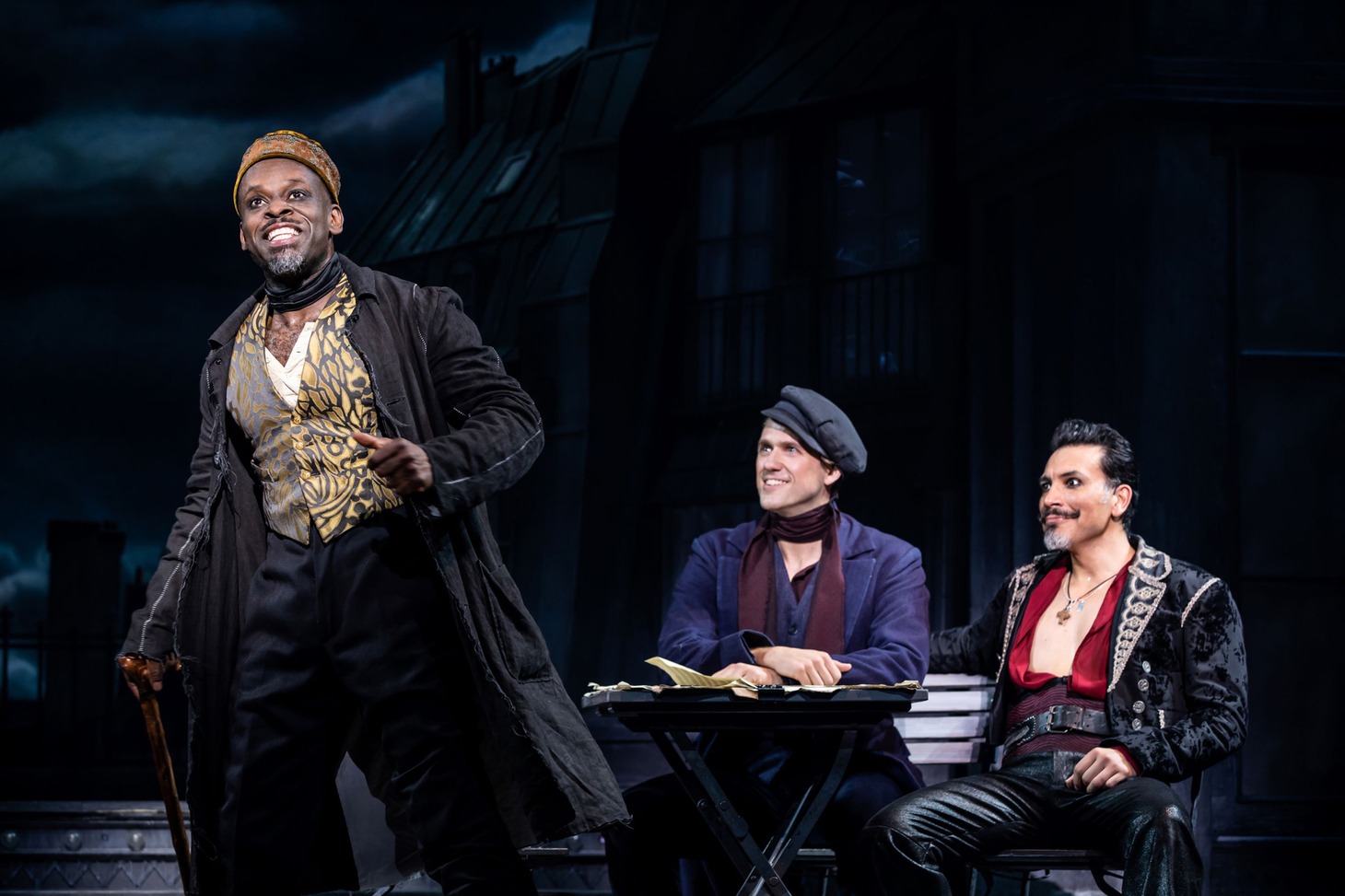 Sahr Ngaujah as Toulouse Lautrec, Aaron Tveit as Christian and Ricky Rojas as Santiago