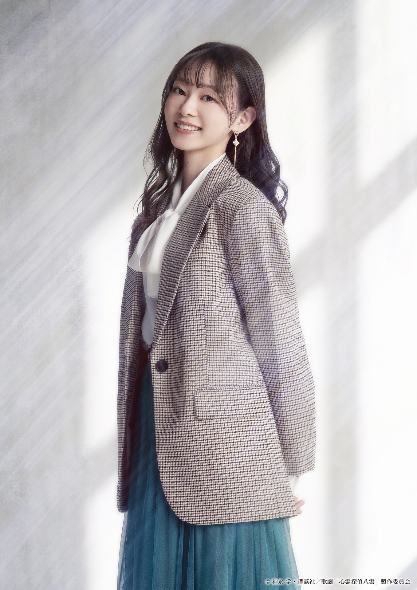橘二葉扮する塩谷冨美香。